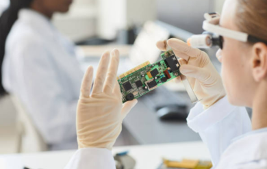 Engineer reviewing PCB design for manufacturing guidelines